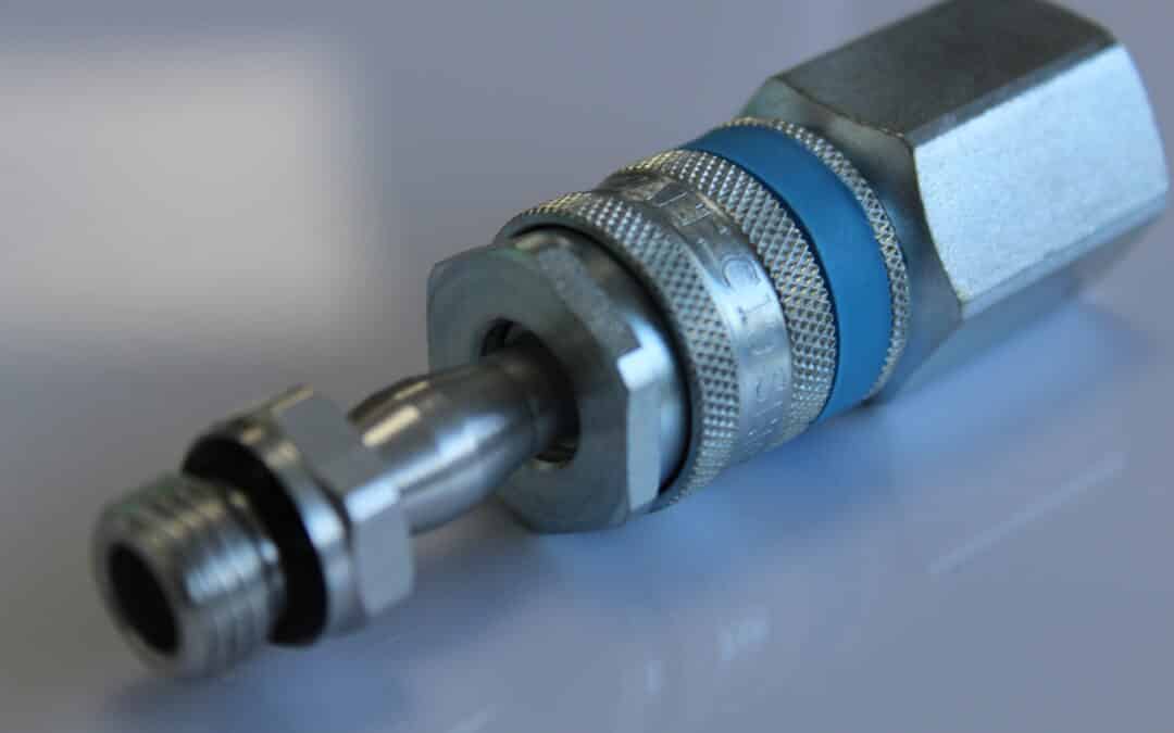 Compressed Air P19 Plug connecting to a C19 Series Coupling. The P19 plug, typically made of durable metal, is aligned with the C19 coupling, which features a robust design for secure and efficient connections.